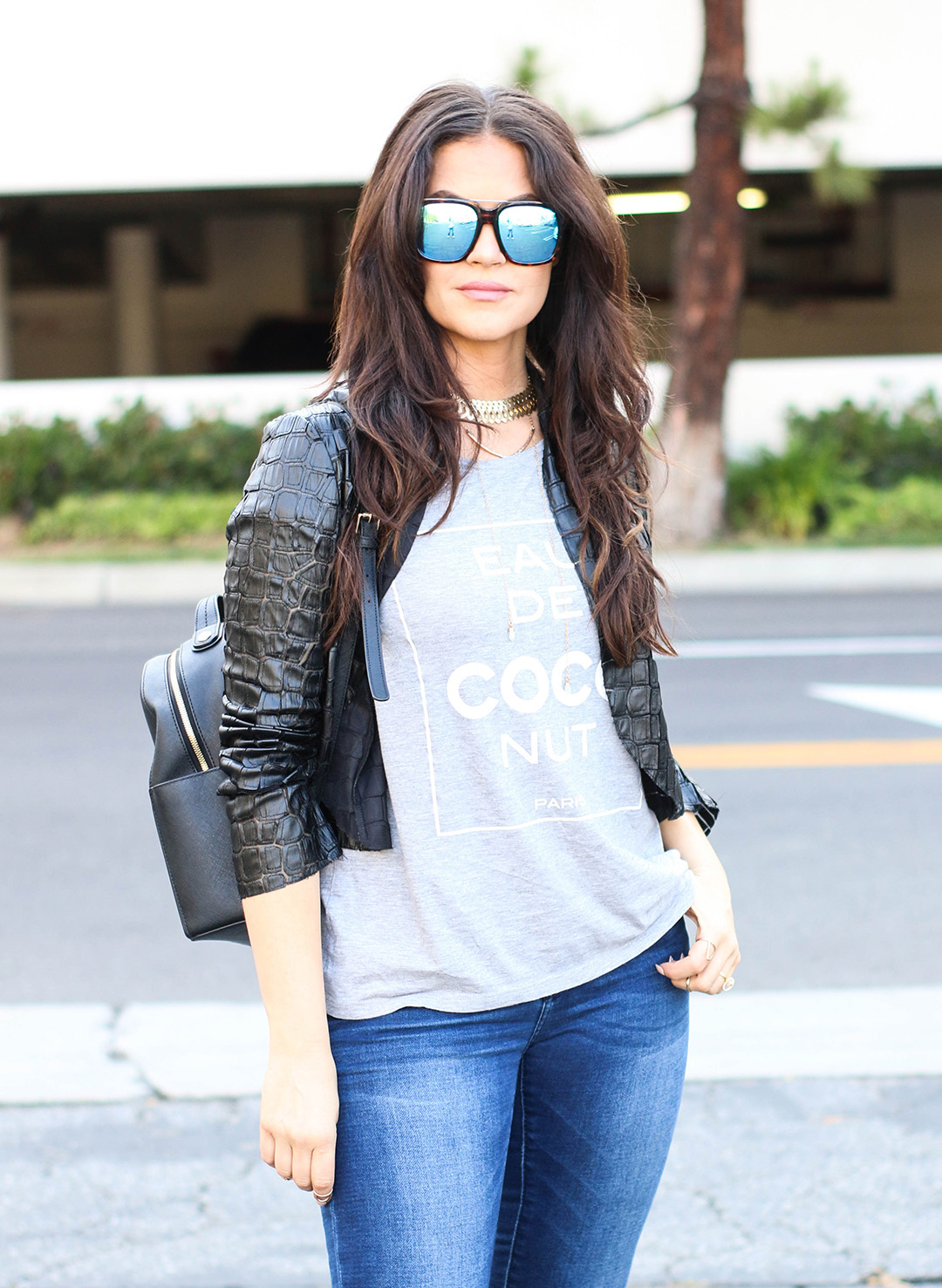 graphic tee and mirrored sunglasses